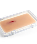 Moulage rană din înjunghiere în coapsă