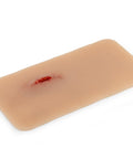 Moulage rană din înjunghiere în coapsă