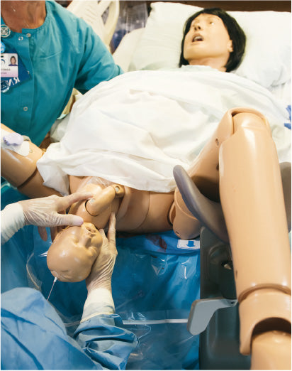 Simulator de naștere matern și neonatal de bază „Lucy"